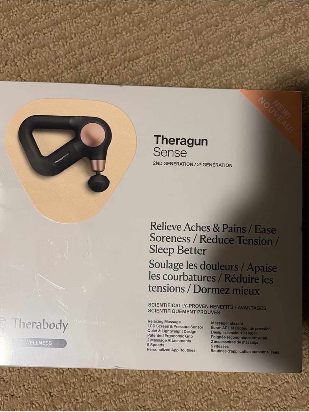 Therabody Massage Gun in Black and Pink Accent
